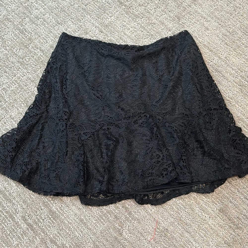 Francesca’s Rixxi Collection mini lace black swing skirt, size medium